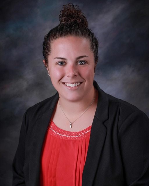 professional headshot of male co-founder and CTO wearing glasses in modern office setting